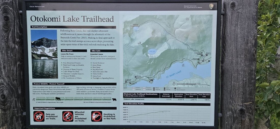 Otokomi Lake Trailhead sign and map at Rising Sun.